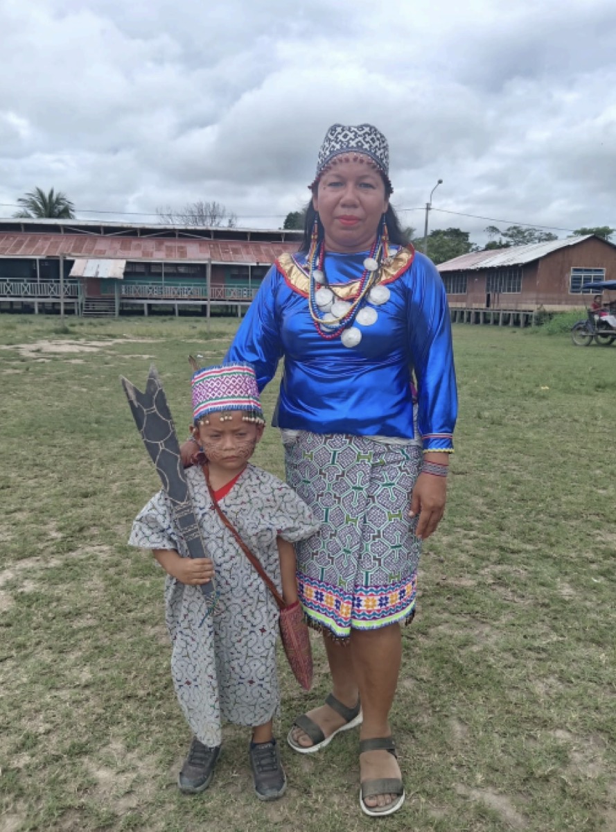 Ida Castro Rojas (Pekonkaisy) in traditional Shipibo-Konibo dress with a young child from the community of Paohyan, Loreto, Peru